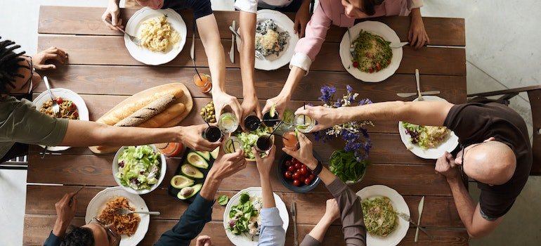 picture of a dinner table with people around