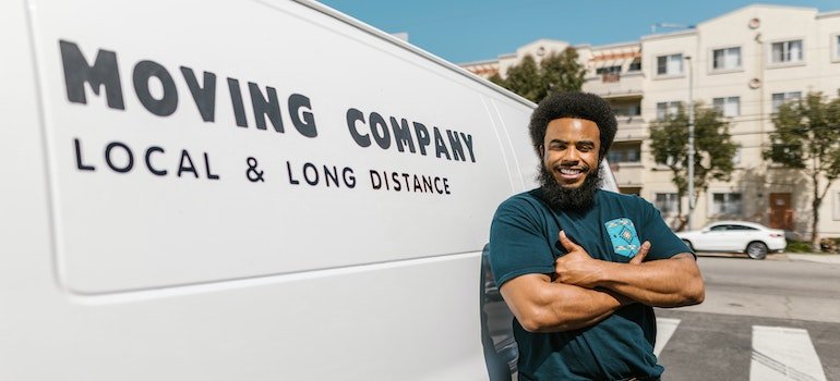 picture of a moving man next to the van